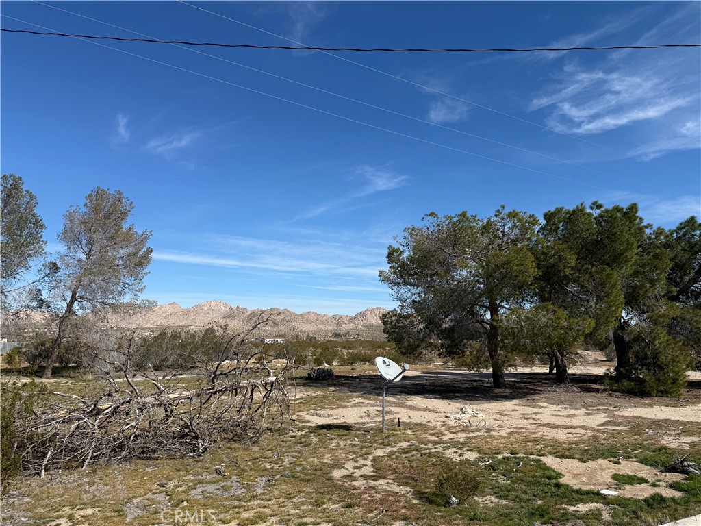 10248 Cavetto Road Lucerne Valley, CA 92356 - Photo 15 of 17 a view of a lake with a mountain in the background