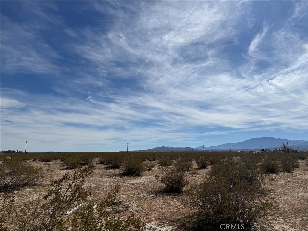 10248 Cavetto Road Lucerne Valley, CA 92356 - Photo 10 of 17 a view of mountain with sunset