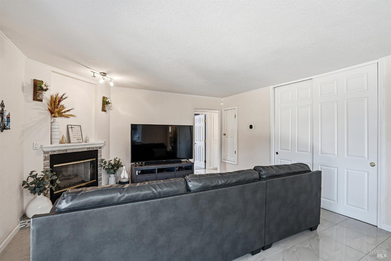 773 Blue Ridge Lane Vacaville, CA 95688 - Photo 13 of 44 a living room with furniture and a flat screen tv