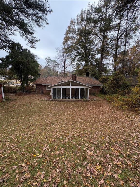 4092 Pepperdine Drive Decatur, GA 30034 - Photo 2 of 6 a front view of a house with a garden
