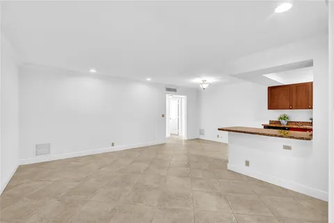 a view of a kitchen with a sink and a microwave