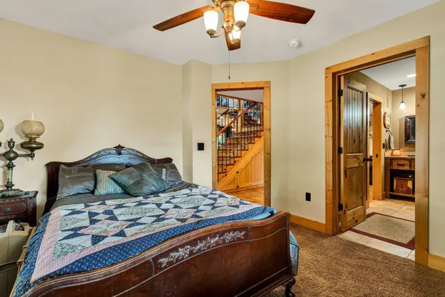 a bedroom with furniture and windows