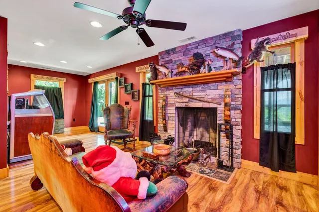 a bedroom with furniture and a flat screen tv