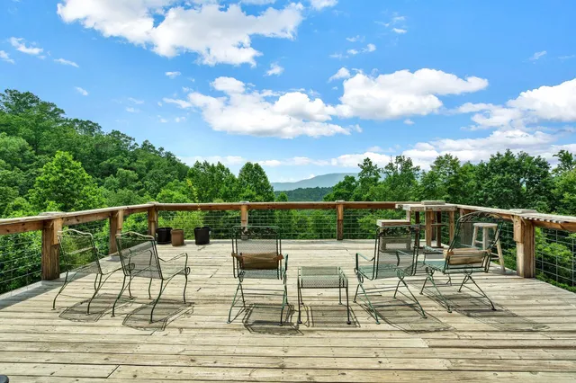 a view of a chairs and table on the terrace