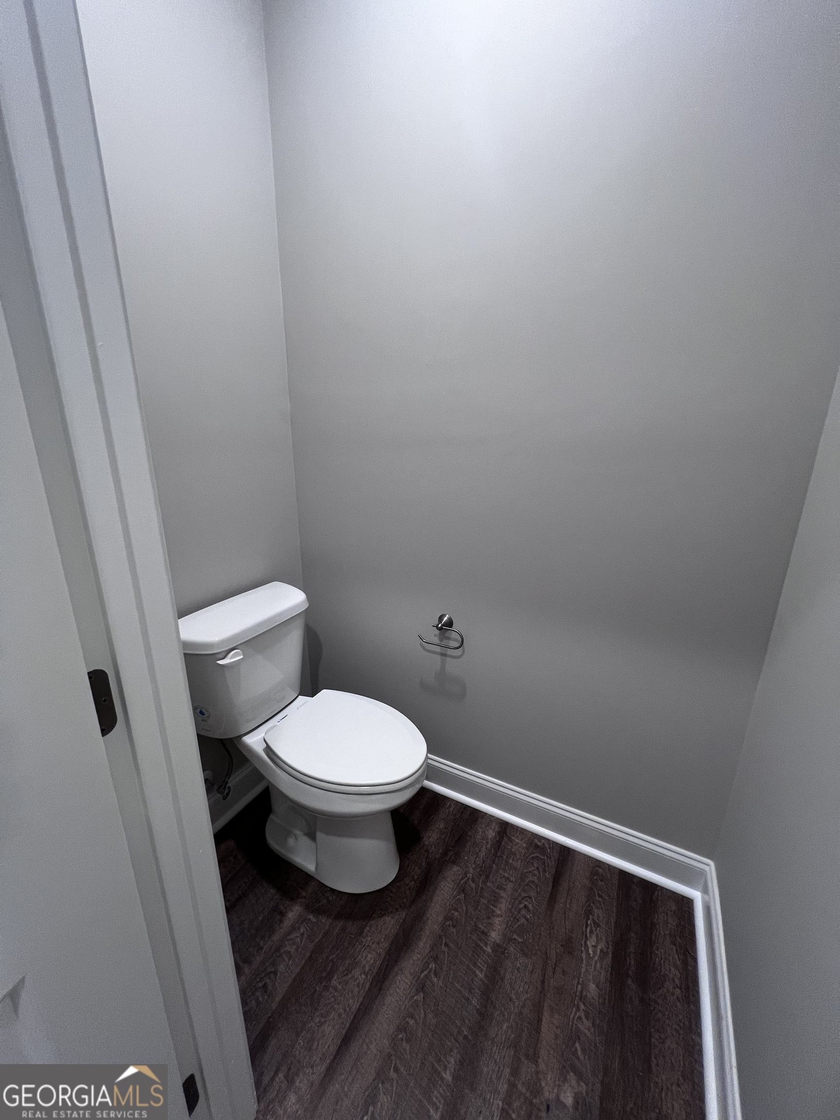 1045 Berkley Court Thomson, GA 30824 - Photo 18 of 32 a bathroom with a toilet and a sink