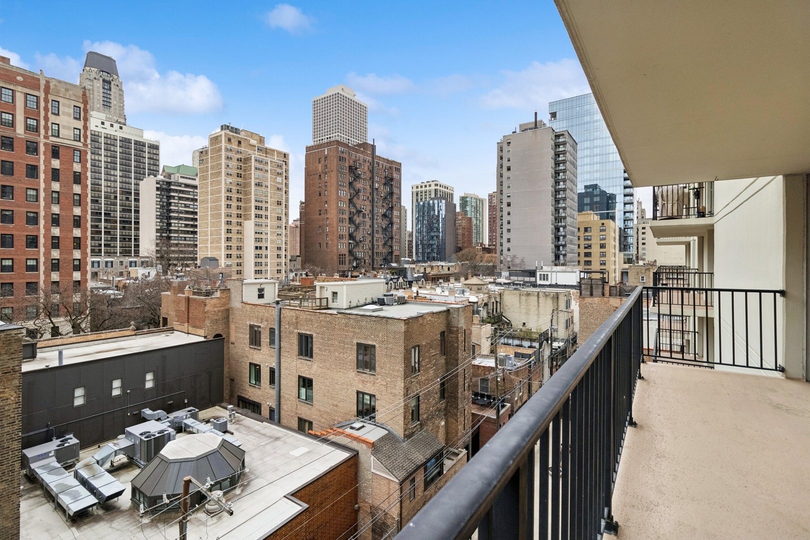 71 East Division Street, Unit 702 Chicago, IL 60611 - Photo 12 of 18 a view of a city with tall buildings