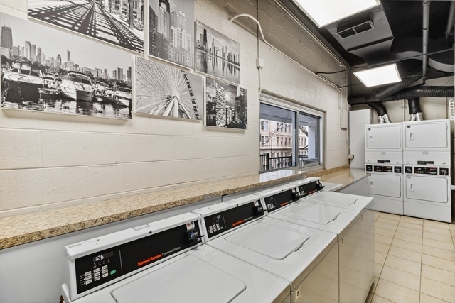 71 East Division Street, Unit 702 Chicago, IL 60611 - Photo 13 of 18 a view of a building with outdoor space