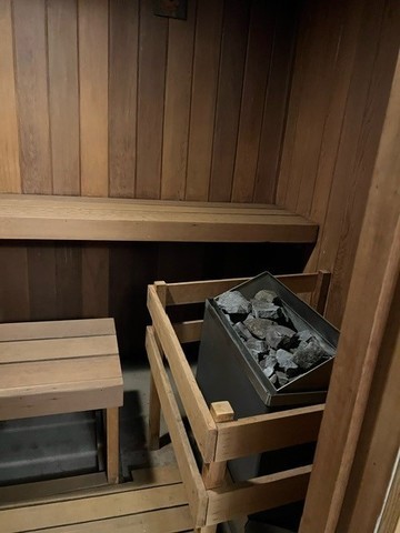 71 East Division Street, Unit 702 Chicago, IL 60611 - Photo 17 of 18 a stove top oven sitting inside of a kitchen