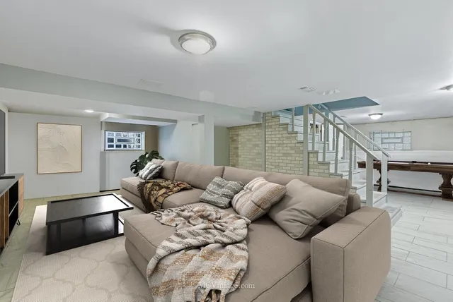 a living room with furniture and a couch