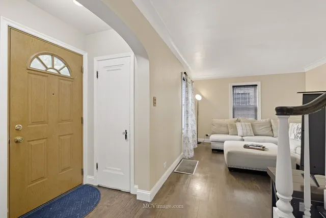 a hotel room with a bed and a window