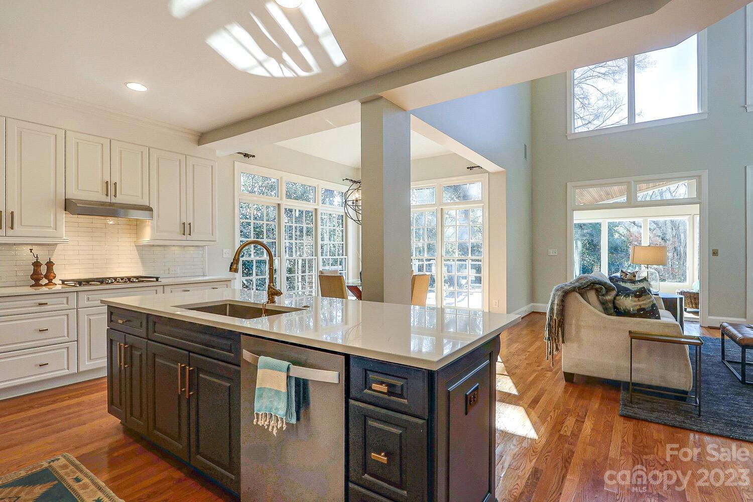 1732 Rutledge Avenue Charlotte, NC 28211 - Photo 12 of 30 a open kitchen with stainless steel appliances granite countertop a sink and cabinets