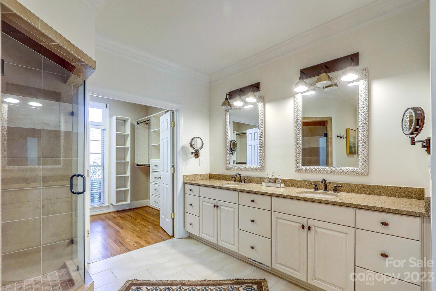 1732 Rutledge Avenue Charlotte, NC 28211 - Photo 16 of 30 a spacious bathroom with a granite countertop sink mirror and shower