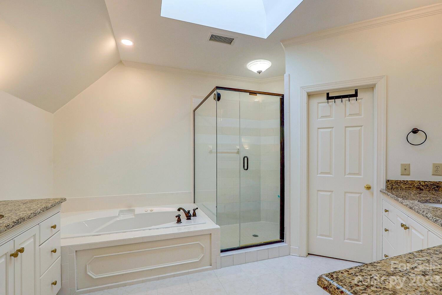 1732 Rutledge Avenue Charlotte, NC 28211 - Photo 20 of 30 a bathroom with a granite countertop sink a toilet and shower