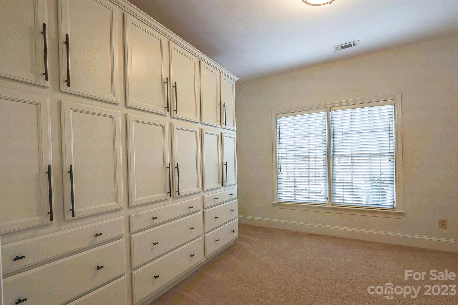 1732 Rutledge Avenue Charlotte, NC 28211 - Photo 22 of 30 an empty room with cabinet