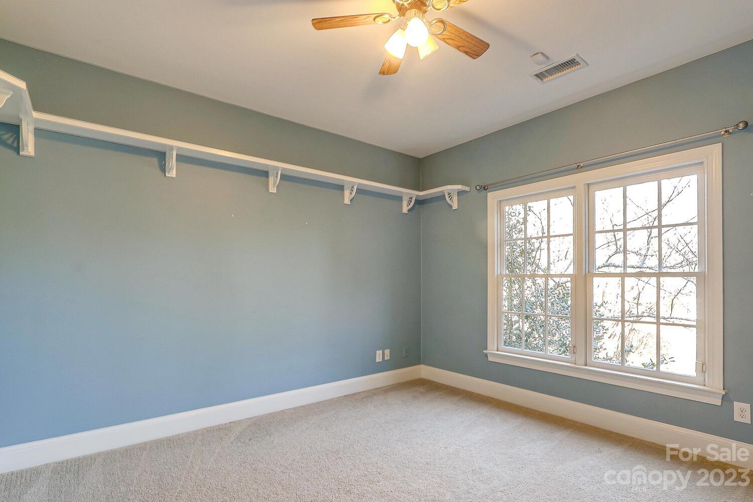 1732 Rutledge Avenue Charlotte, NC 28211 - Photo 27 of 30 a view of an empty room with a window