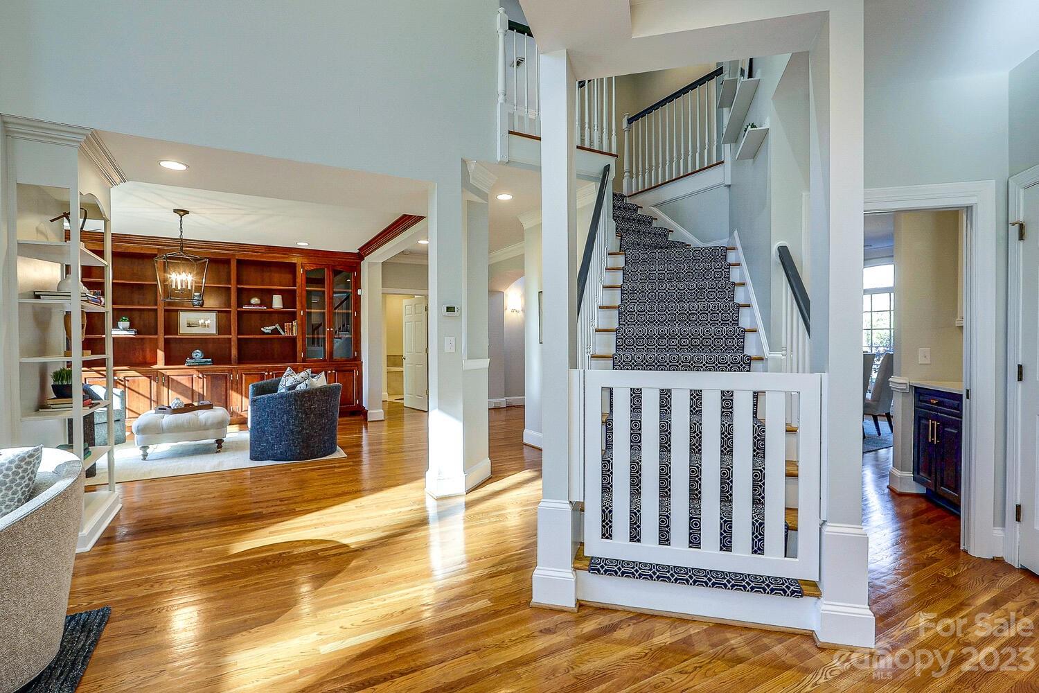 1732 Rutledge Avenue Charlotte, NC 28211 - Photo 6 of 30 a view of a livingroom with furniture staircase and kitchen view