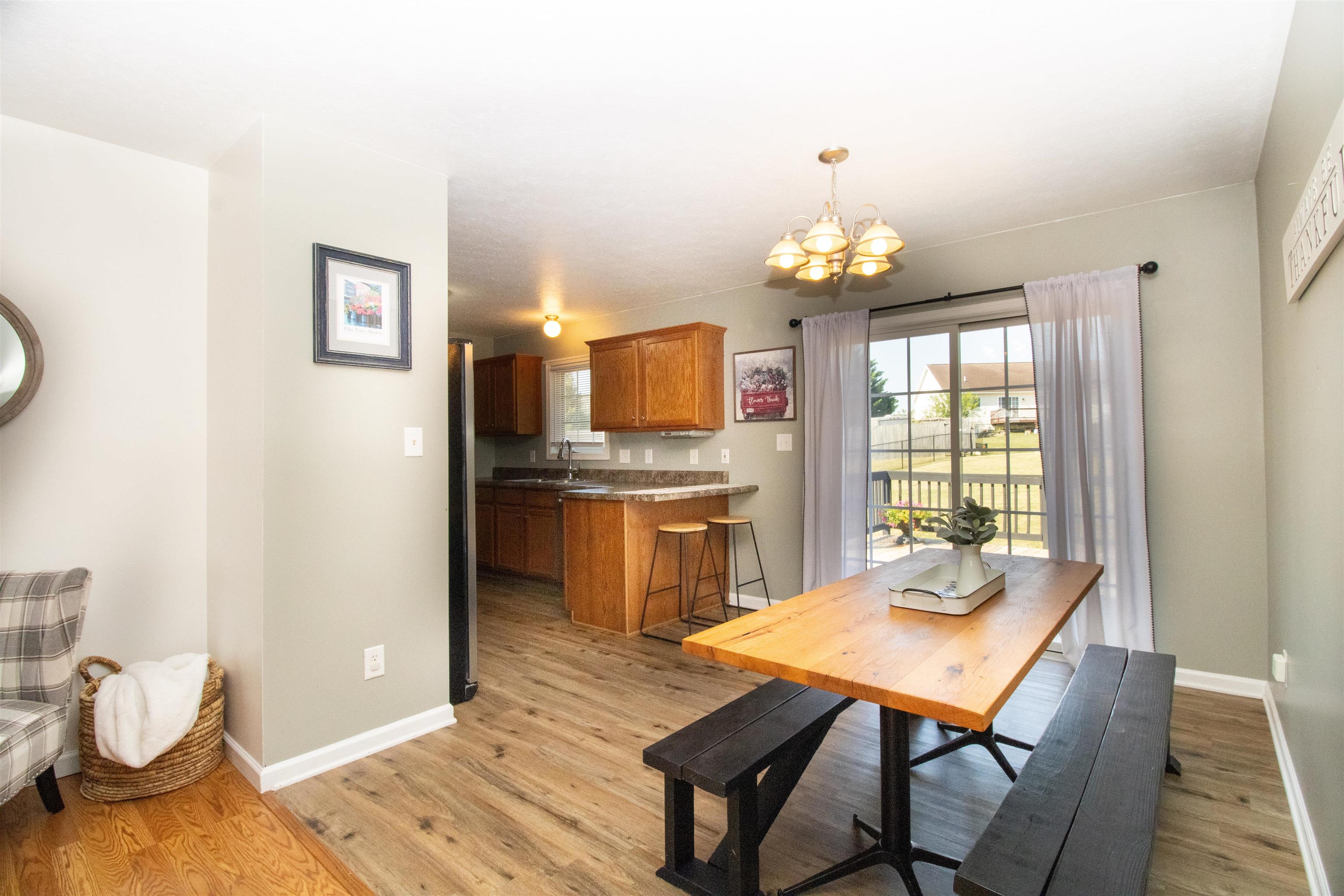 37 Danforth Drive Weyers Cave, VA 24486 - Photo 14 of 45 a view of a dining room with furniture window and wooden floor