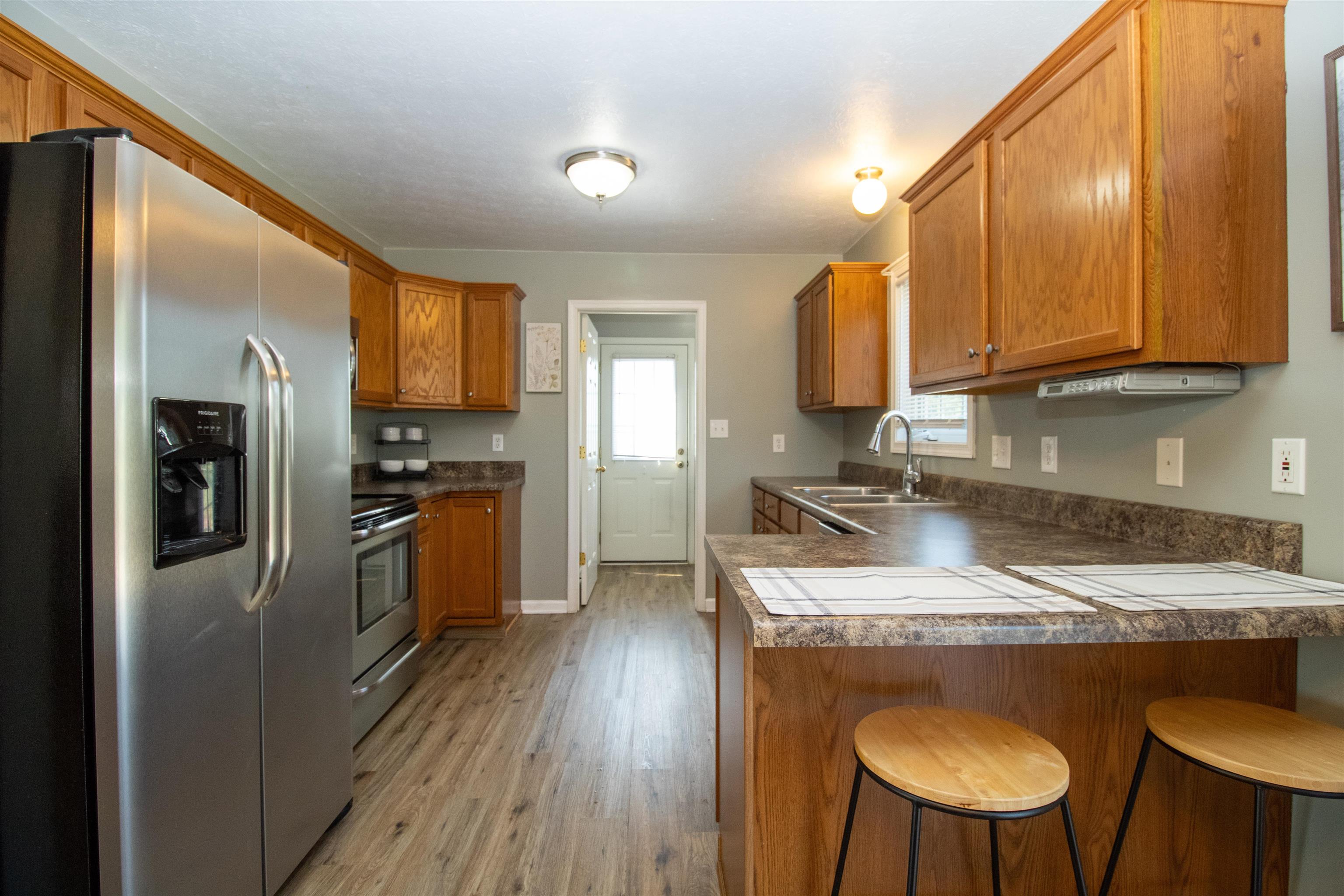 37 Danforth Drive Weyers Cave, VA 24486 - Photo 16 of 45 a kitchen with a refrigerator sink and cabinets