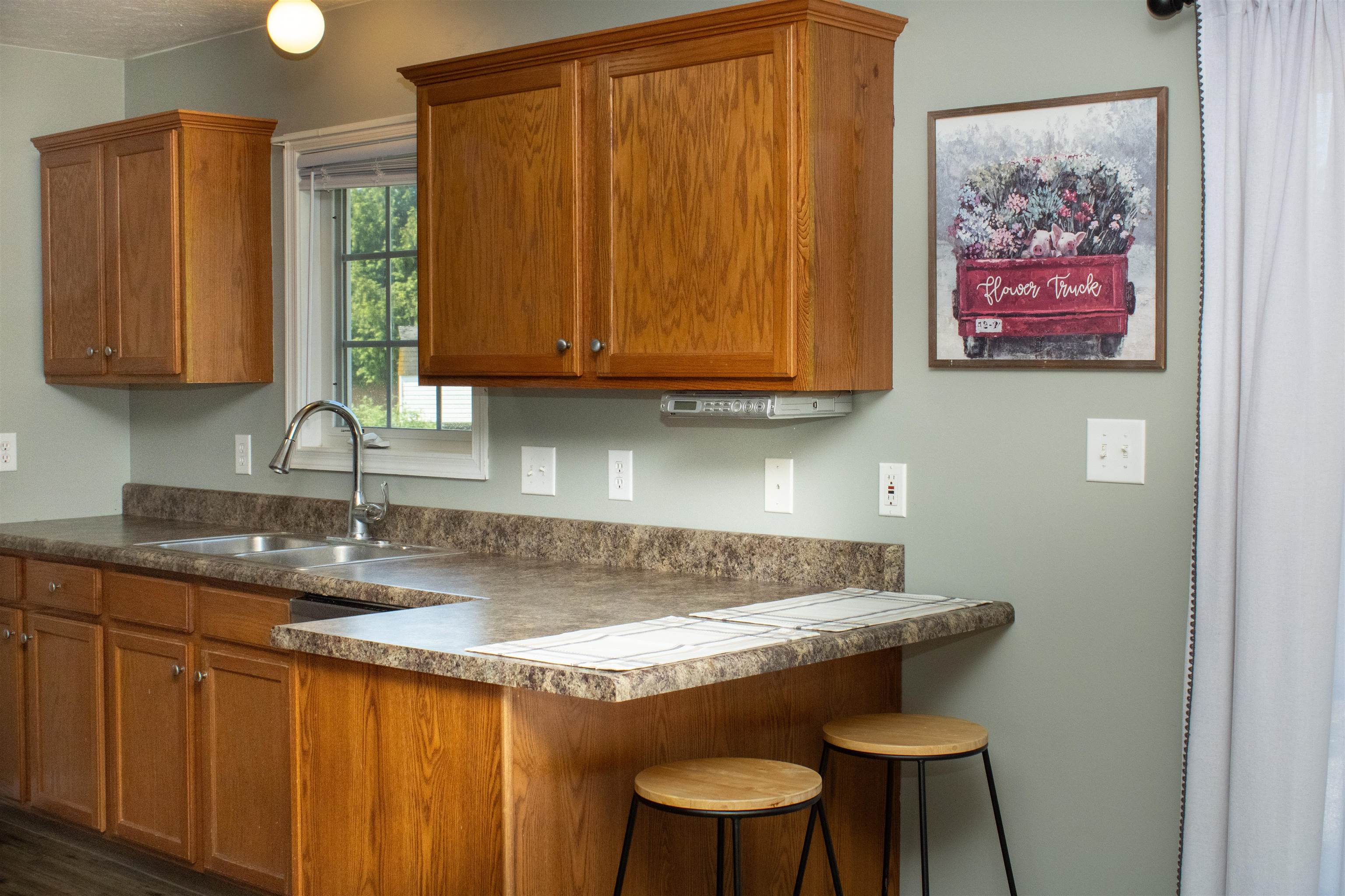 37 Danforth Drive Weyers Cave, VA 24486 - Photo 21 of 45 a kitchen with a sink cabinets and a window