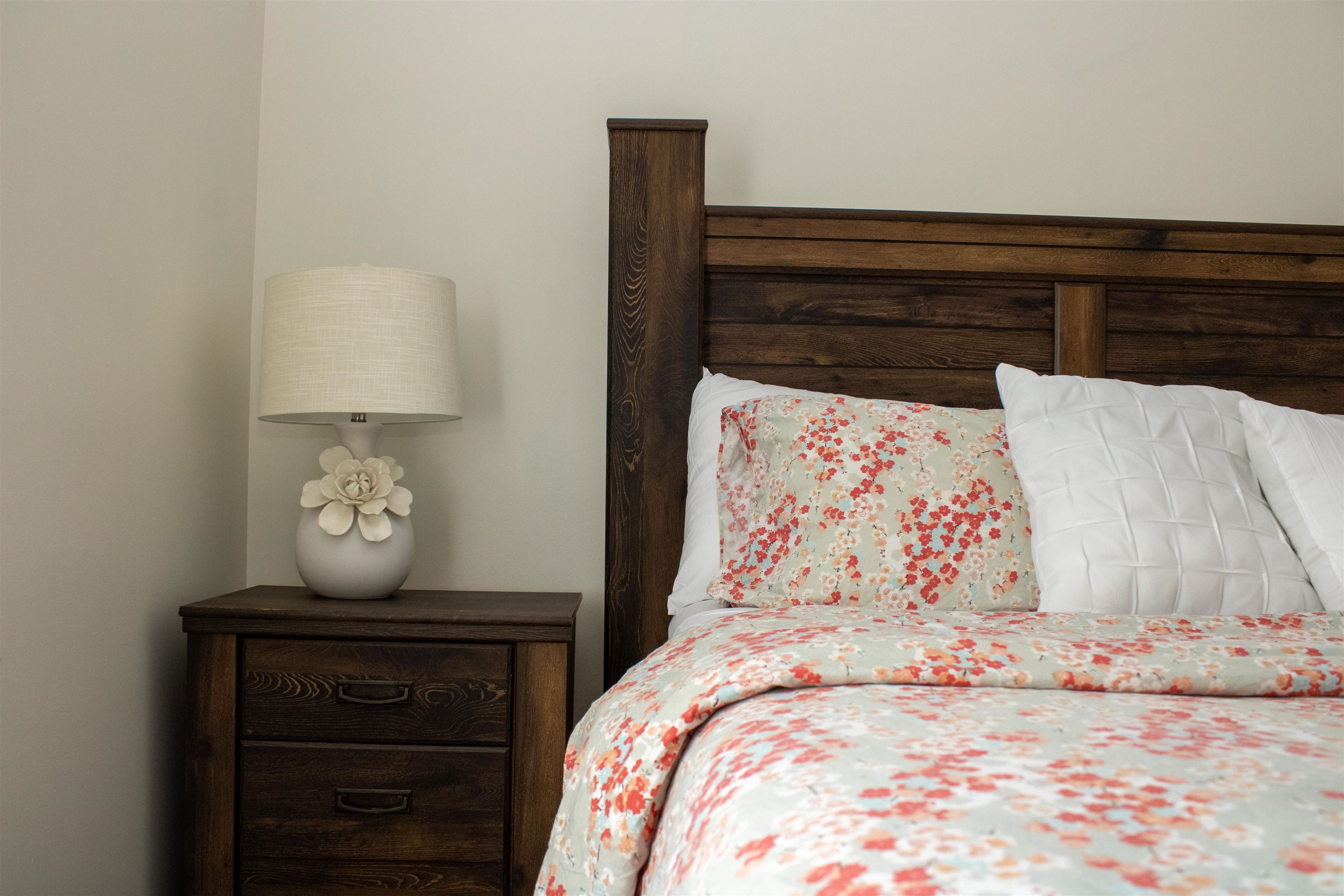 37 Danforth Drive Weyers Cave, VA 24486 - Photo 30 of 45 a bed sitting in a bedroom next to a lamp