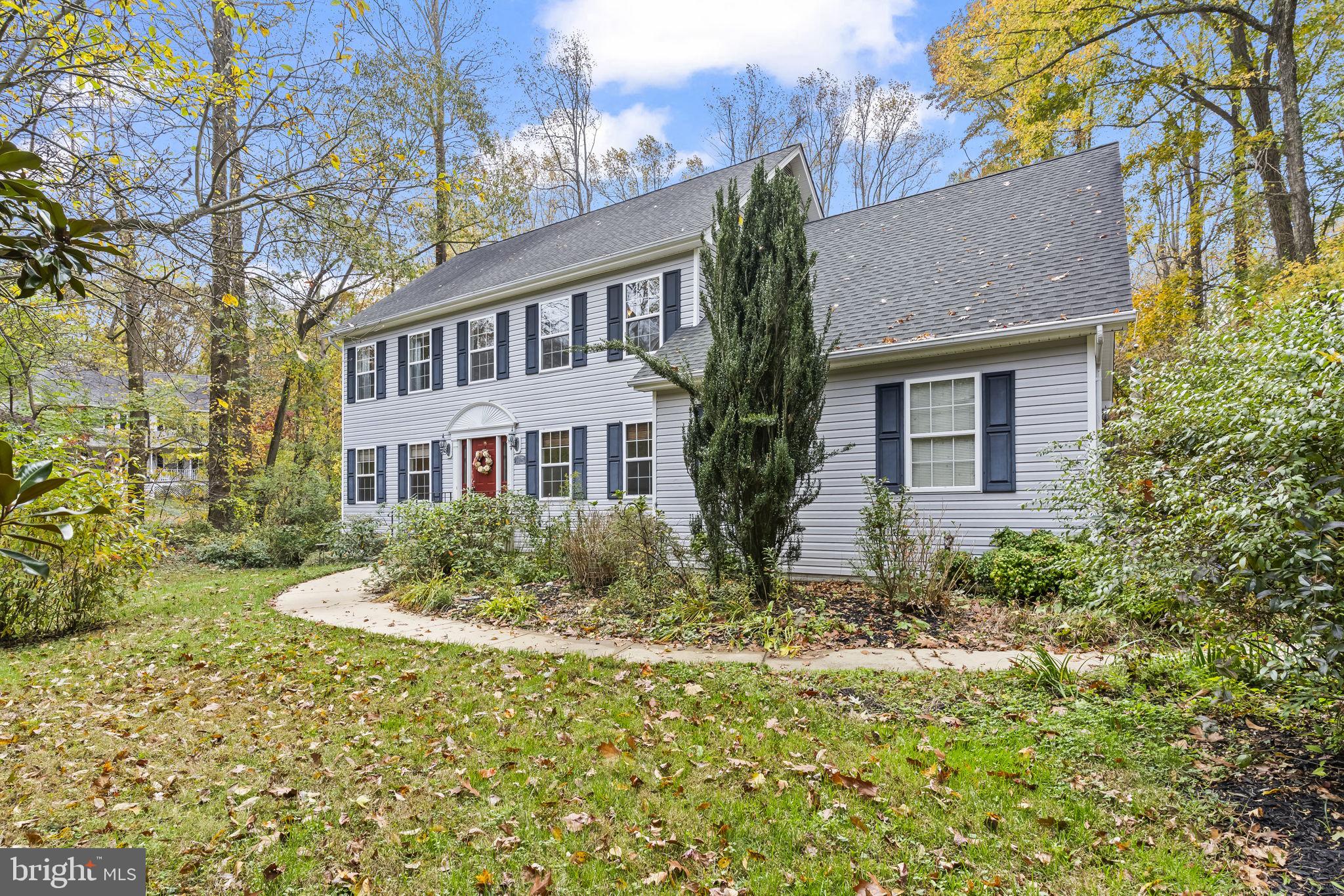 1425 Abbey Lane Huntingtown, MD 20639 - Photo 1 of 42 a front view of a house with a yard