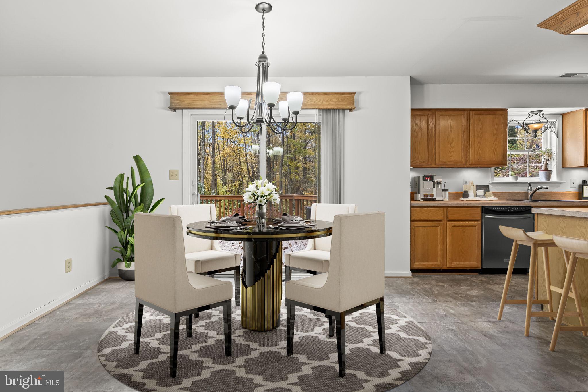 1425 Abbey Lane Huntingtown, MD 20639 - Photo 14 of 42 a view of a dining room with furniture window and wooden floor