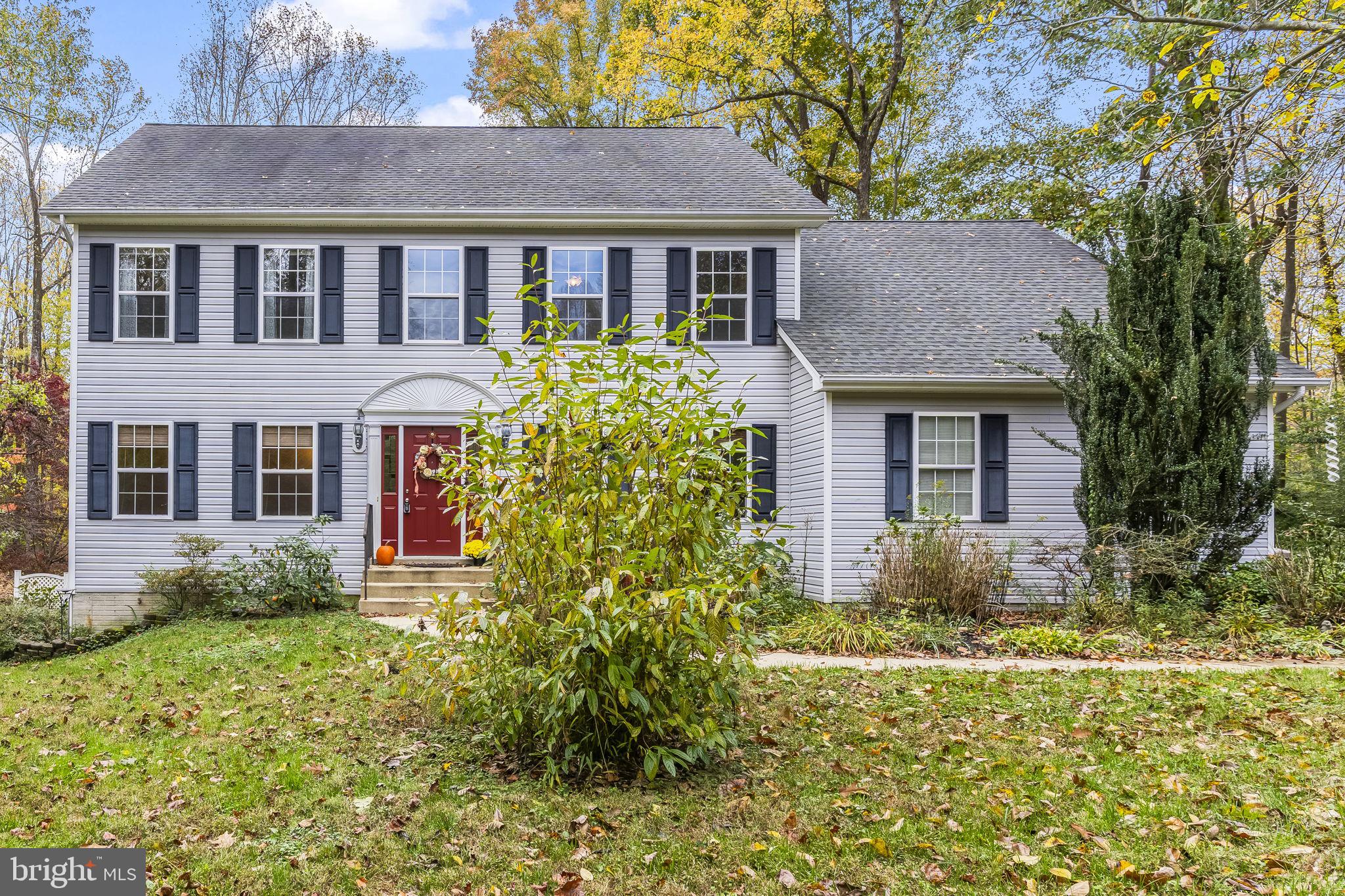 1425 Abbey Lane Huntingtown, MD 20639 - Photo 3 of 42 front view of a house with a yard