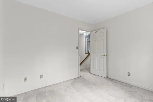 an empty room with a door