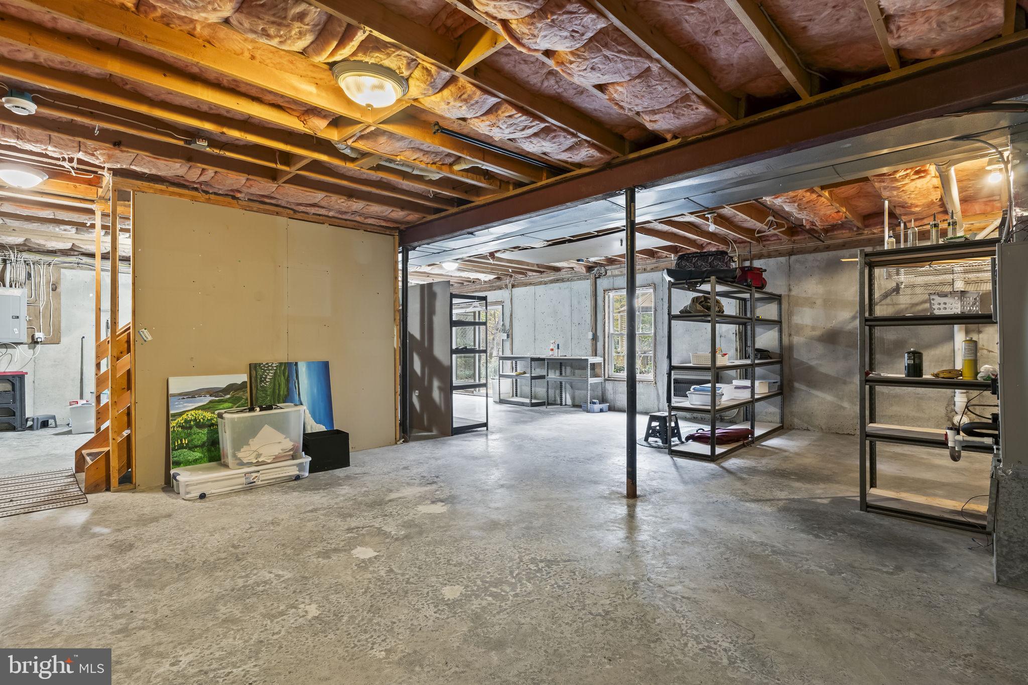 1425 Abbey Lane Huntingtown, MD 20639 - Photo 36 of 42 a view of a storage room with a garage