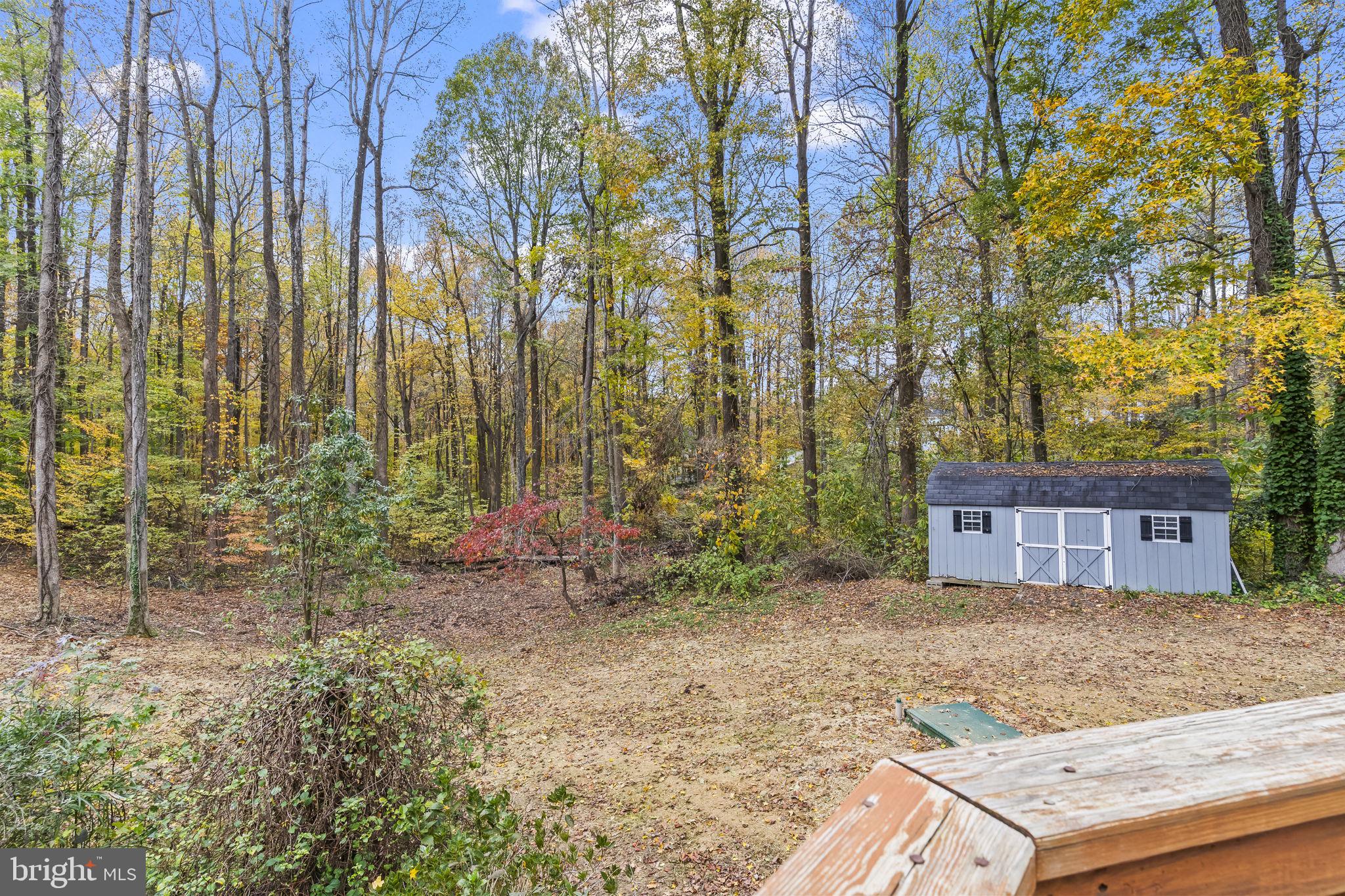 1425 Abbey Lane Huntingtown, MD 20639 - Photo 39 of 42 a view of a house with a yard and sitting area