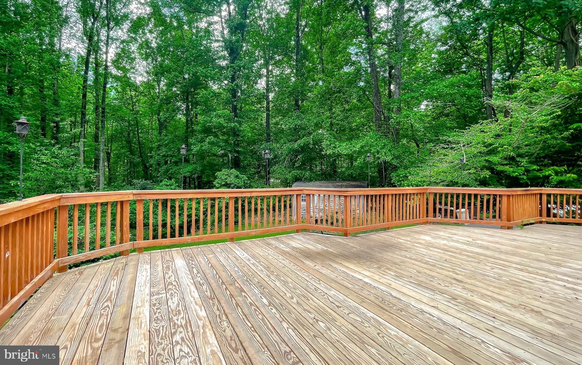 1425 Abbey Lane Huntingtown, MD 20639 - Photo 6 of 42 a view of balcony with wooden floor and fence