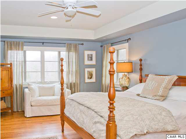 1190 Turner Mountain Road Charlottesville, VA 22901 - Photo 15 of 44 a bedroom with a large bed couch and a window