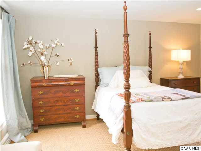 1190 Turner Mountain Road Charlottesville, VA 22901 - Photo 20 of 44 a bedroom with a bed window and cabinet