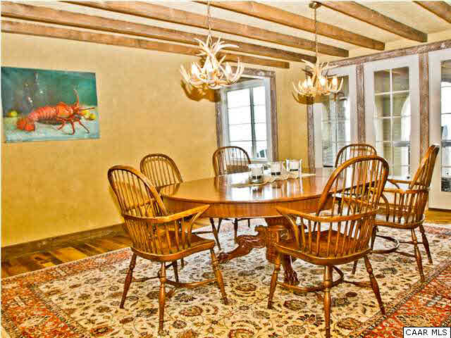 1190 Turner Mountain Road Charlottesville, VA 22901 - Photo 7 of 44 a view of a dining room with furniture and chandelier