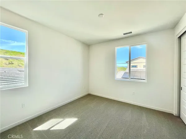 an empty room with closet