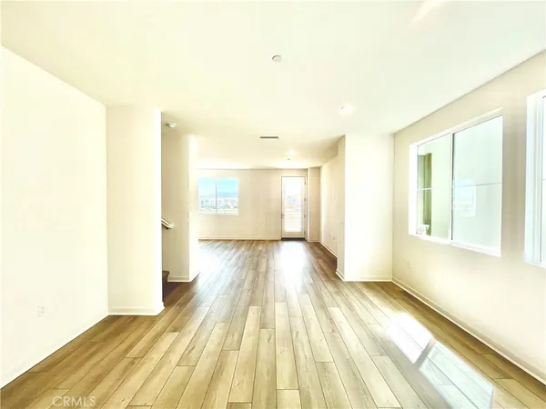 a view of kitchen with wooden floor