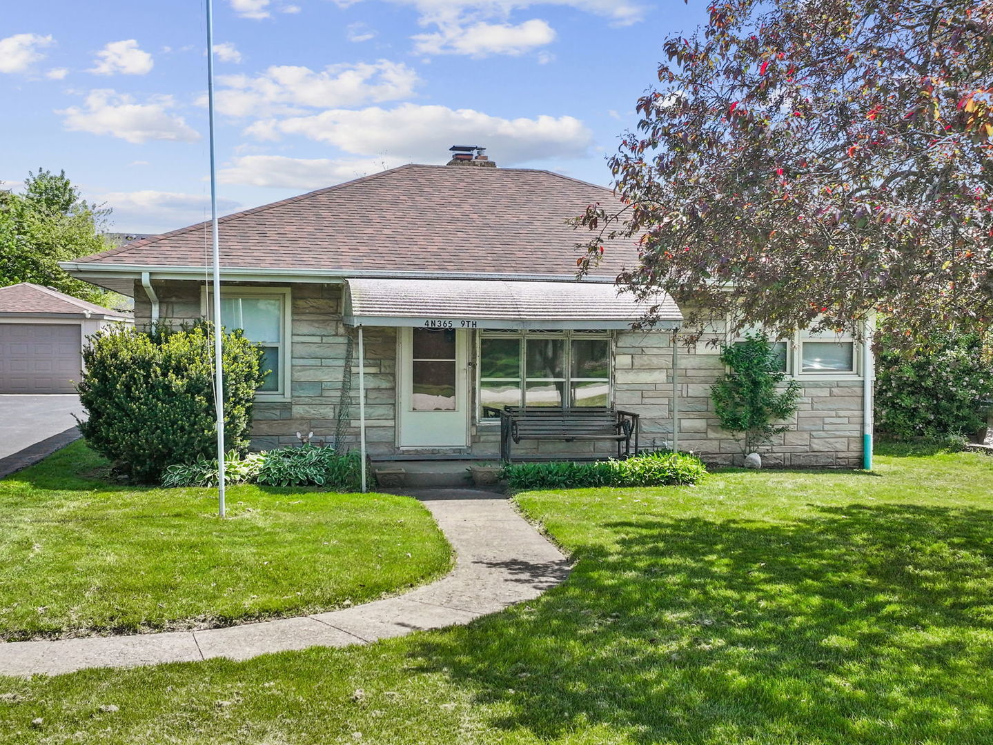 4N365 9th Avenue Addison, IL 60101 - Photo 1 of 24 a view of a house with a yard and plants