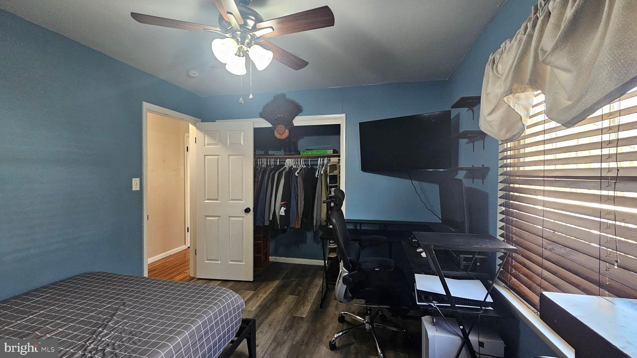 64 Dubois Road Bridgeton, NJ 08302 - Photo 17 of 31 a bedroom with a bed and a chandelier