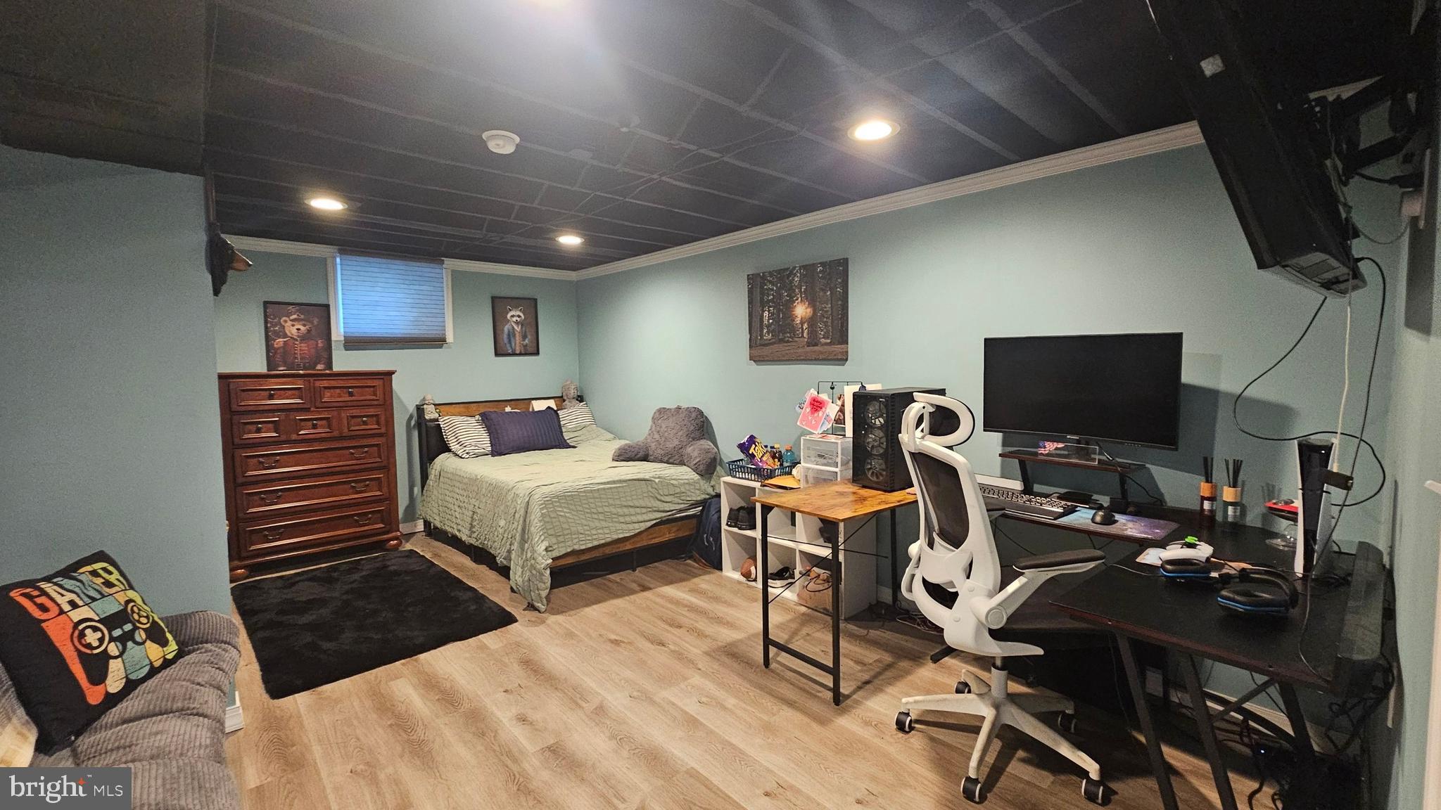 64 Dubois Road Bridgeton, NJ 08302 - Photo 20 of 31 a bedroom with a bed and a flat screen tv