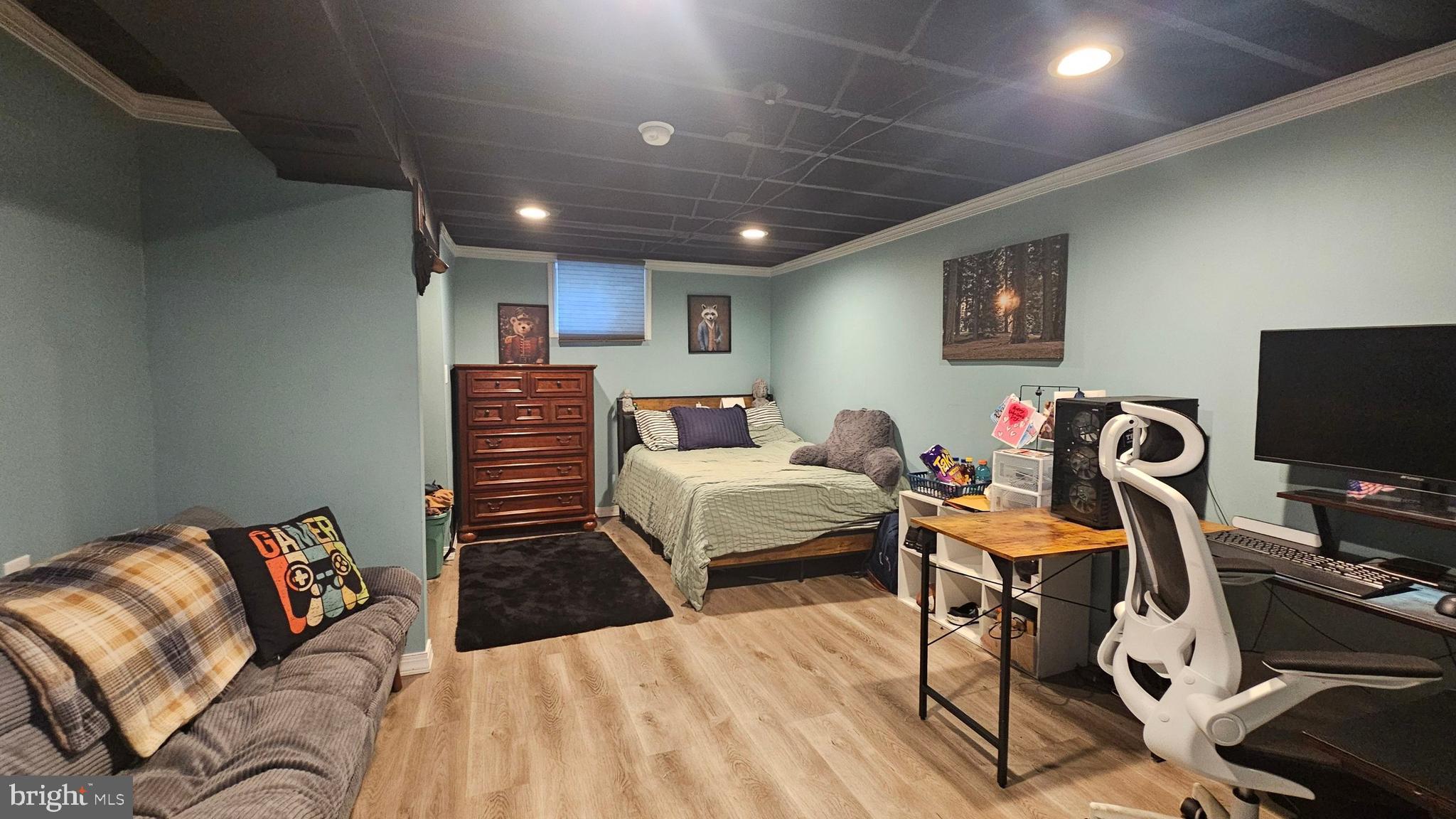 64 Dubois Road Bridgeton, NJ 08302 - Photo 21 of 31 a bedroom with a bed and a flat screen tv
