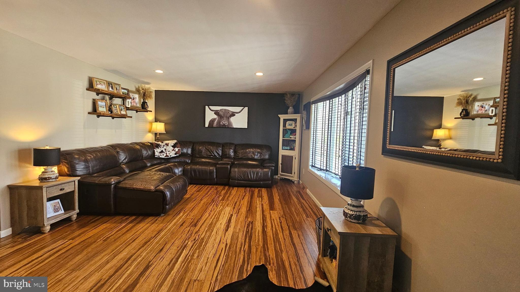 64 Dubois Road Bridgeton, NJ 08302 - Photo 3 of 31 a living room with furniture and a flat screen tv