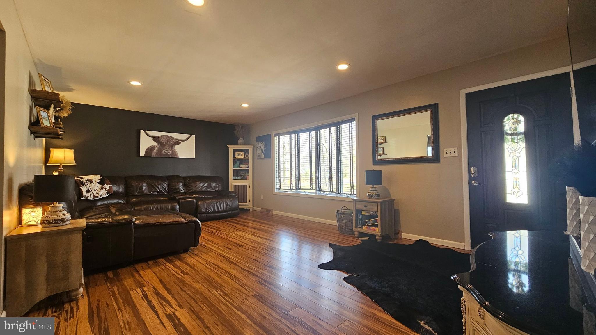 64 Dubois Road Bridgeton, NJ 08302 - Photo 4 of 31 a living room with furniture and wooden floor
