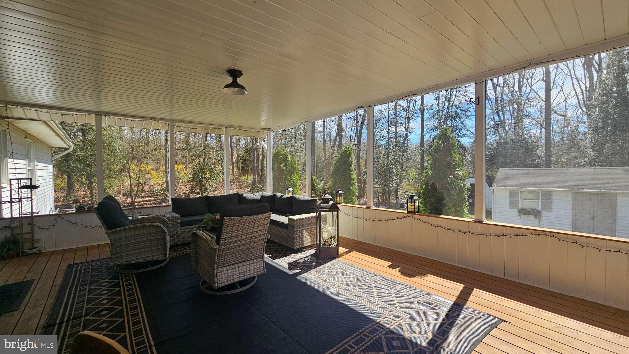 64 Dubois Road Bridgeton, NJ 08302 - Photo 9 of 31 a living room with furniture and large windows