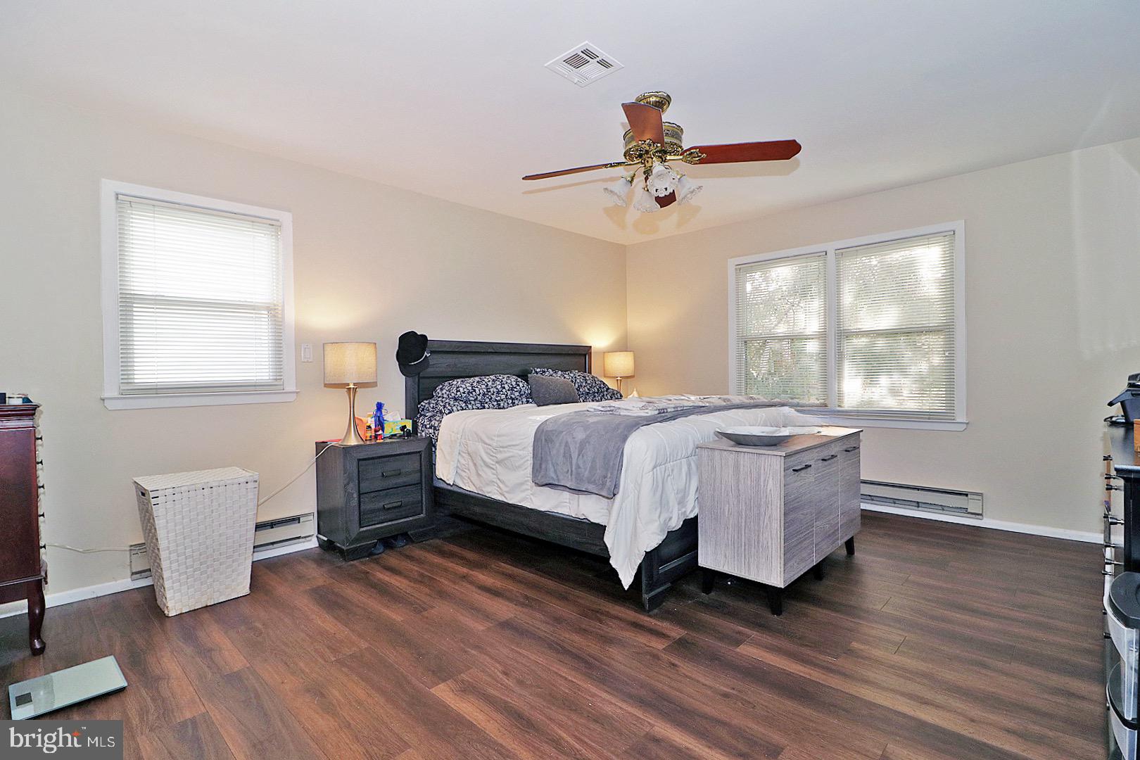 23 Abbey Road Brick, NJ 08723 - Photo 13 of 37 a bedroom with a bed and a window