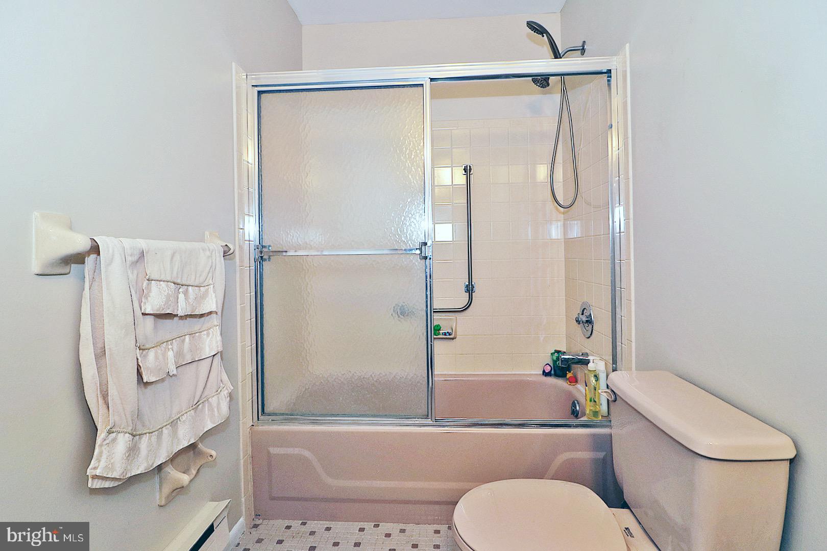 23 Abbey Road Brick, NJ 08723 - Photo 23 of 37 a bathroom with a granite countertop bathtub shower sink mirror and toilet