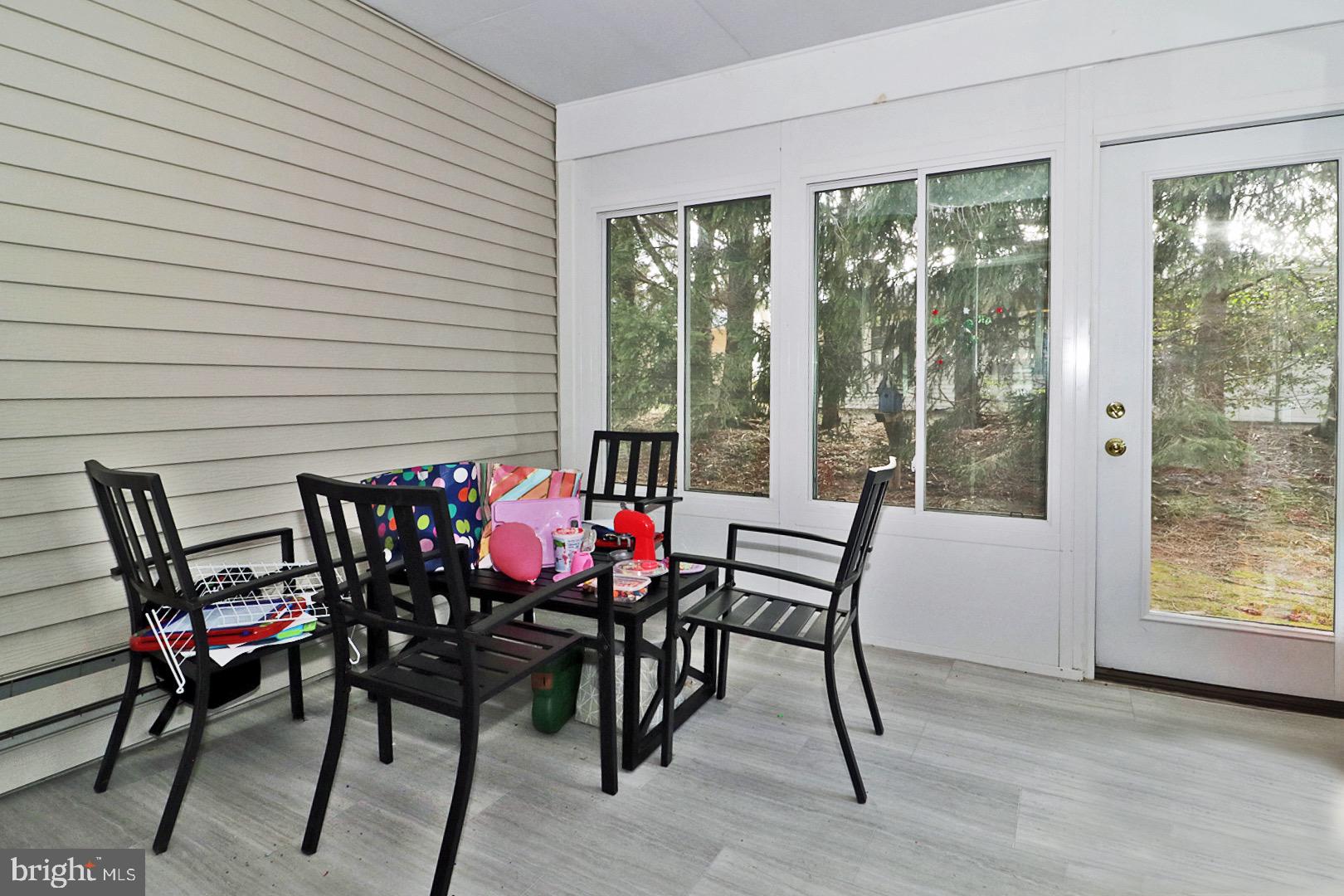 23 Abbey Road Brick, NJ 08723 - Photo 29 of 37 a view of a dining room with furniture and window