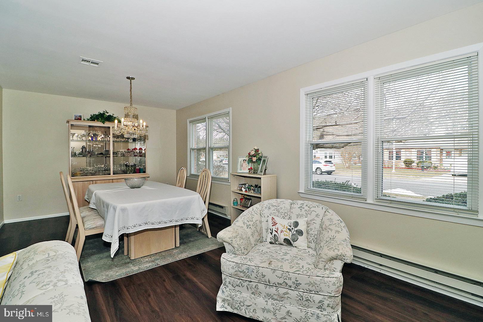 23 Abbey Road Brick, NJ 08723 - Photo 6 of 37 a living room with furniture and a window