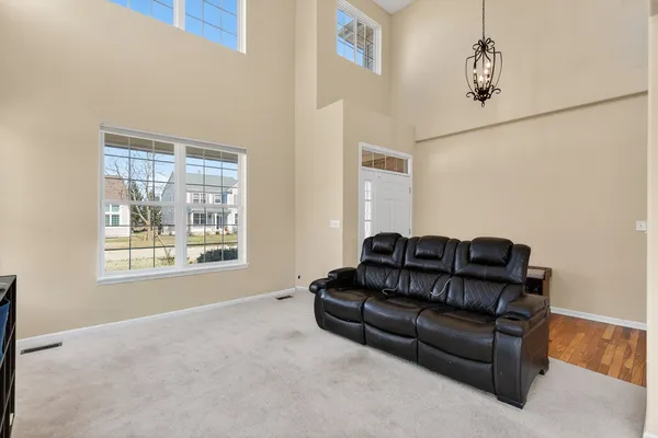 a living room with couches and a couch