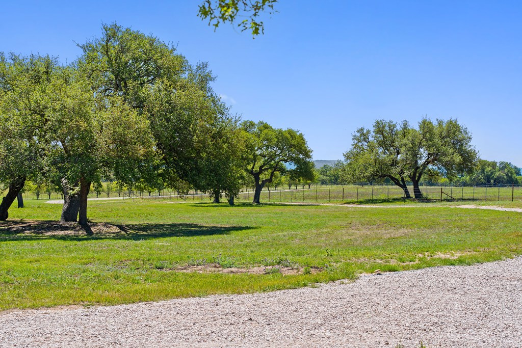 784 Ranch Road 2721 Johnson City, TX 78636 - Photo 13 of 20 a view of a golf course with a garden