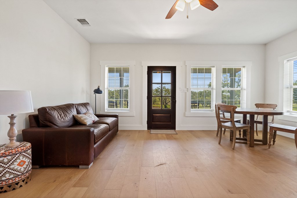 784 Ranch Road 2721 Johnson City, TX 78636 - Photo 14 of 20 a living room with furniture and a large window